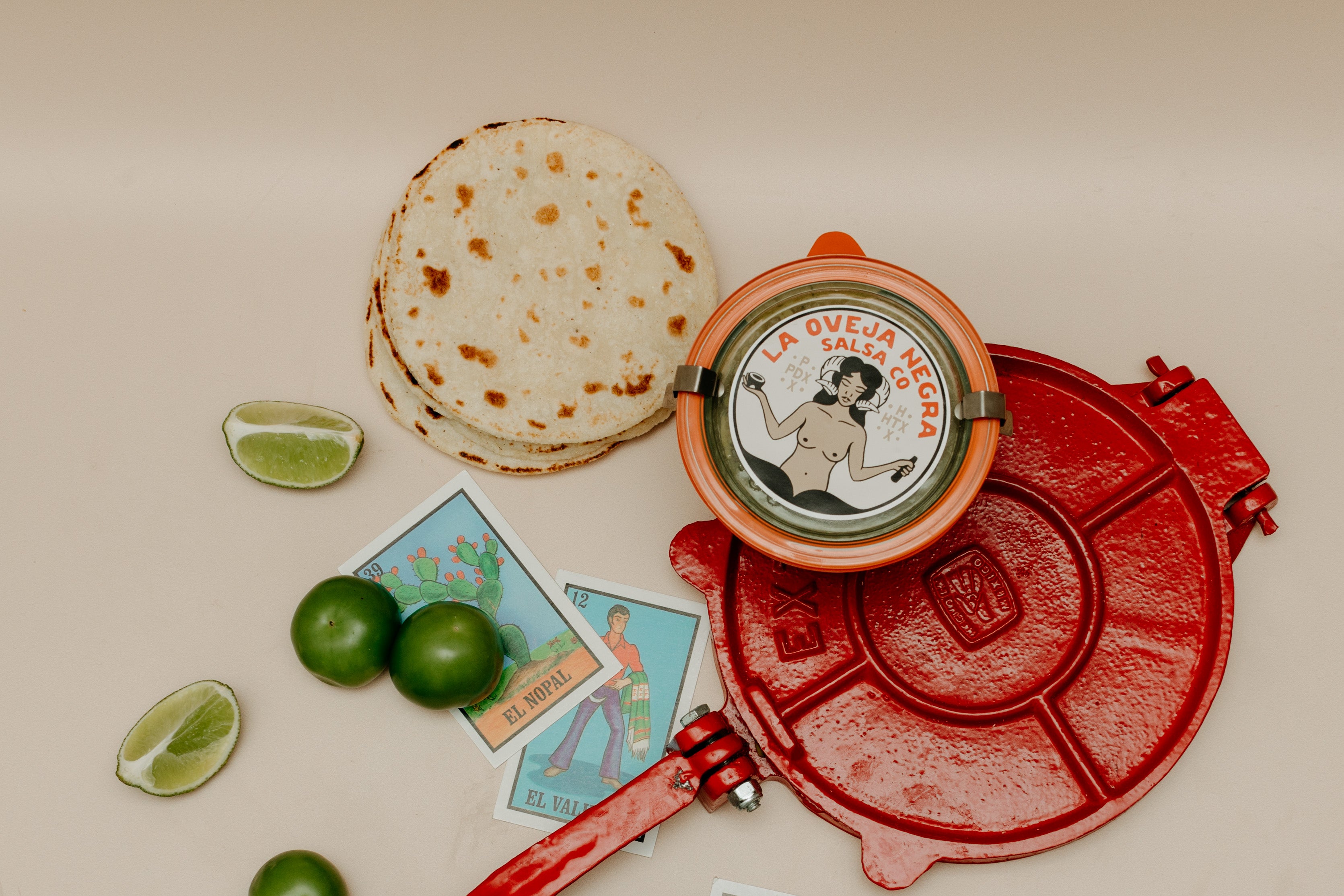 Tortilla press with green salsa